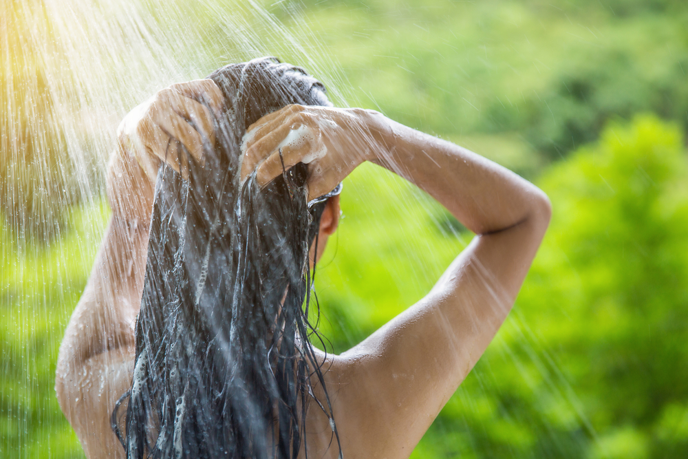 Washing hair with water including minerals